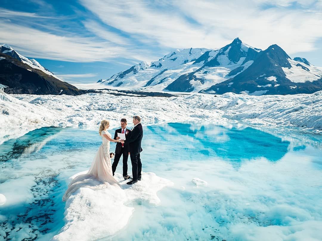 Former WWE stars Carrion Cross and Scarlett married on top of a glacier ...